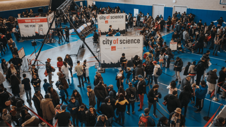 A crowd of people at an indoor event