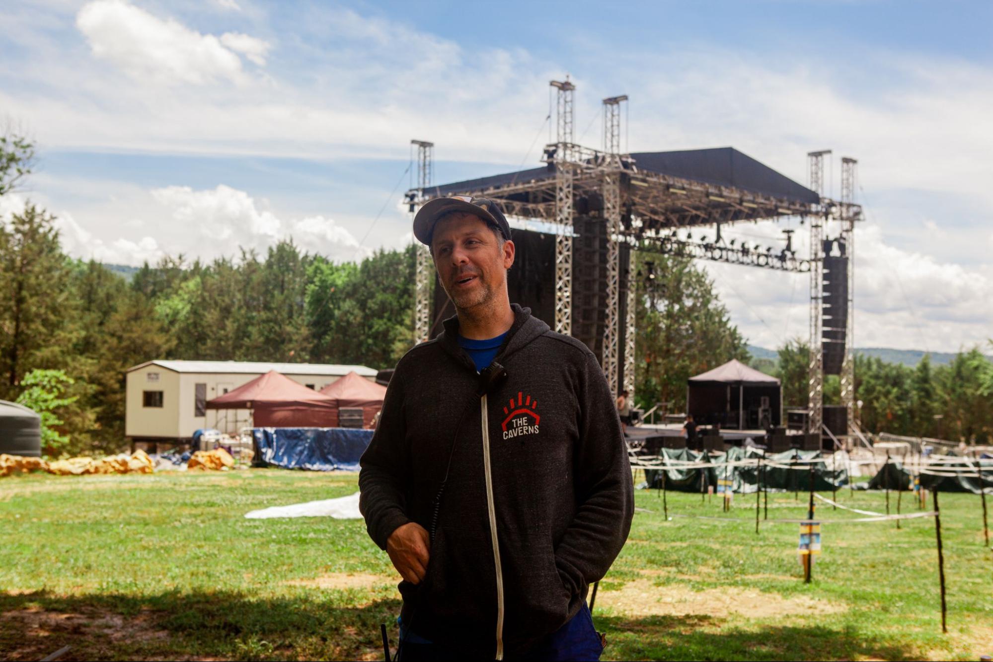 A person in front of an event venue