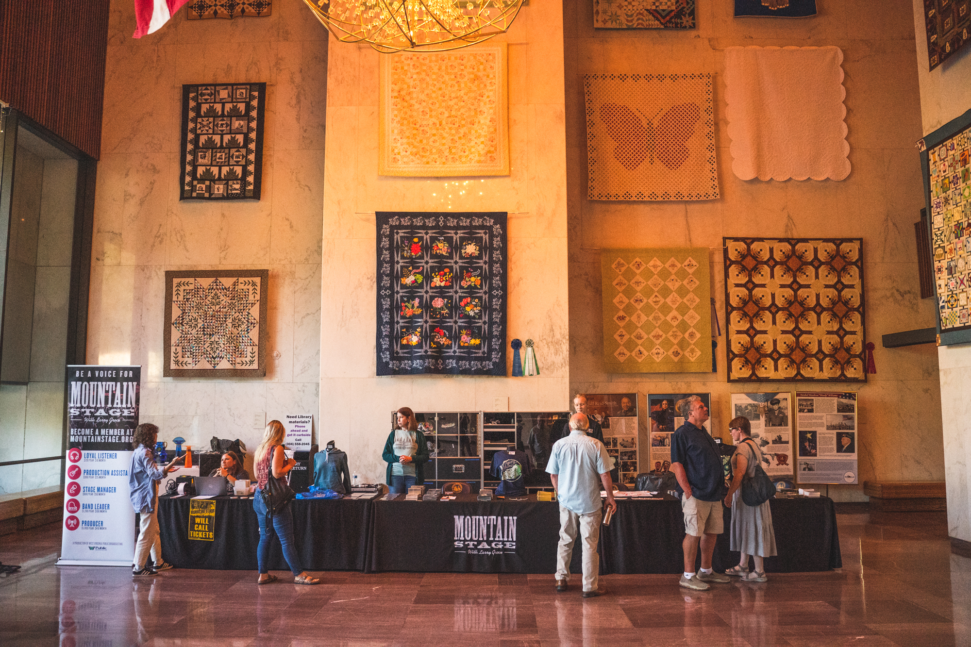 People at a table promoting their event