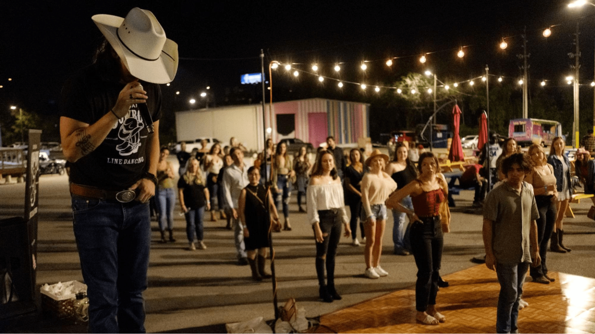 Party guests take part in dance