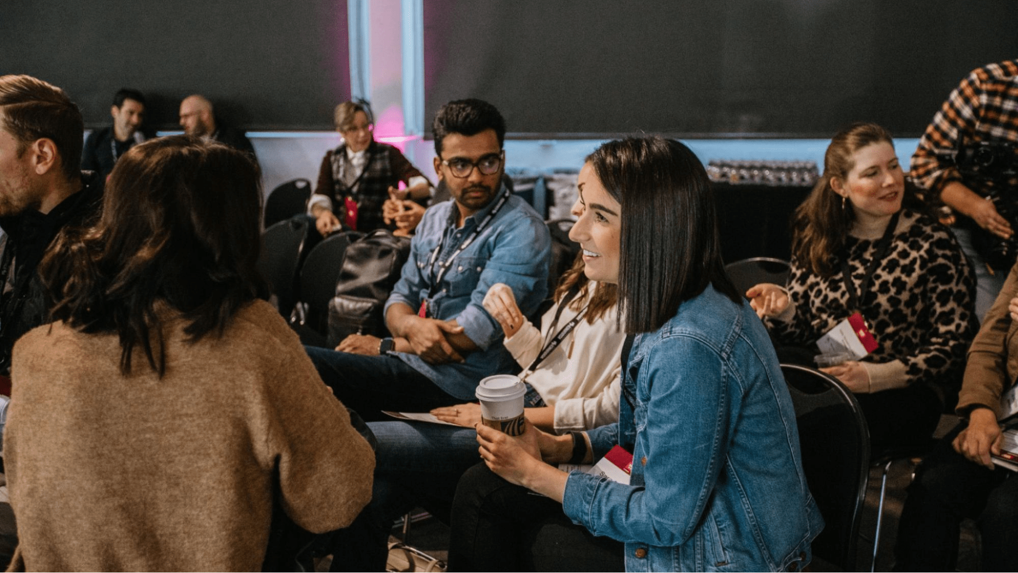 people talking at conference