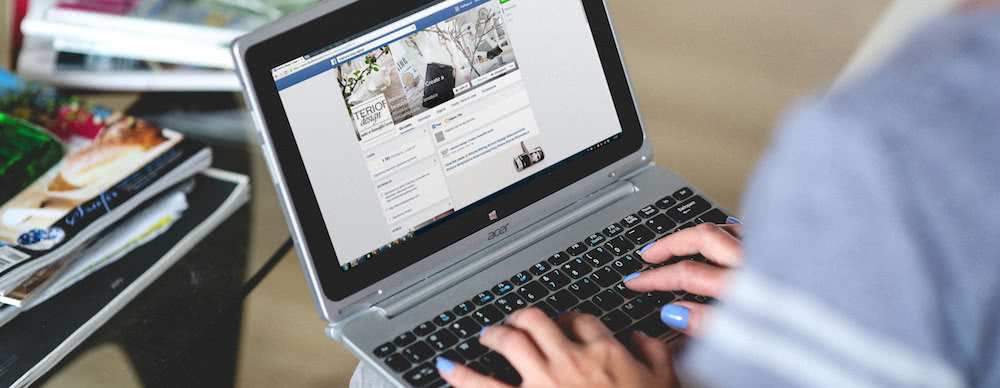 best name for event planning business A women types on a laptop