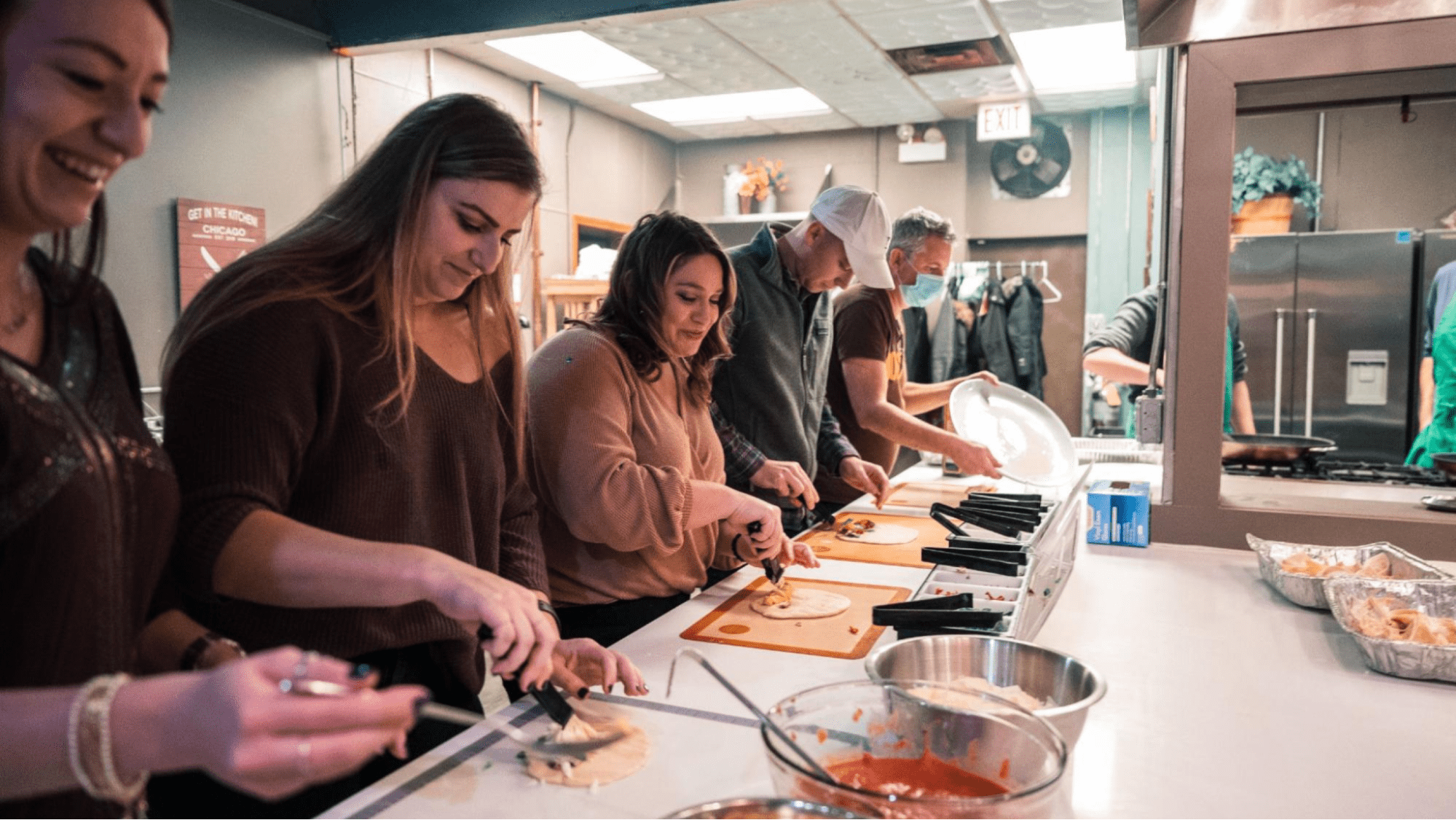 People cooking at an event