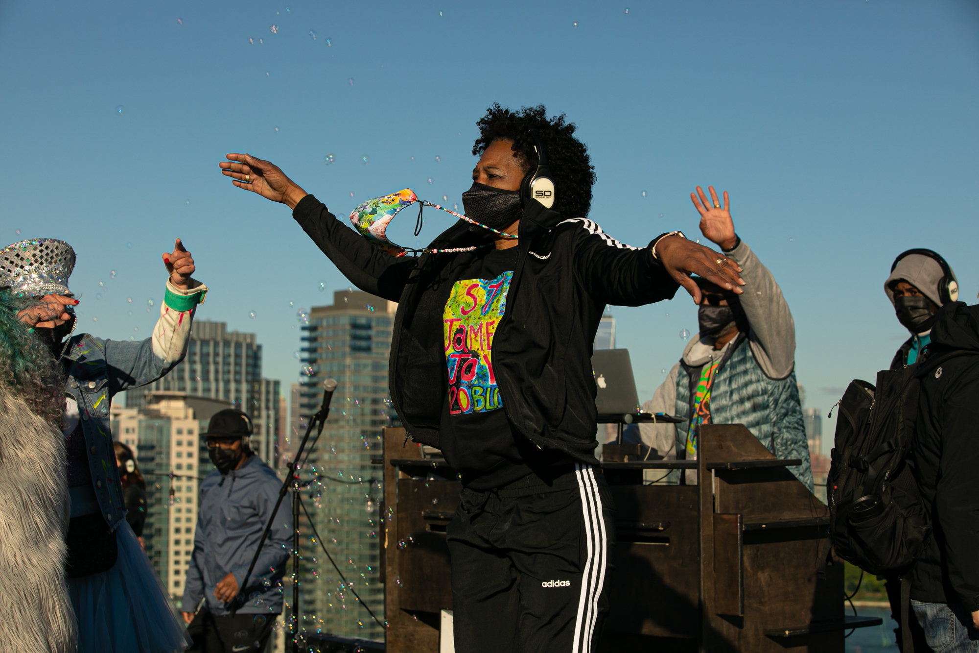 People dancing while wearing headphones