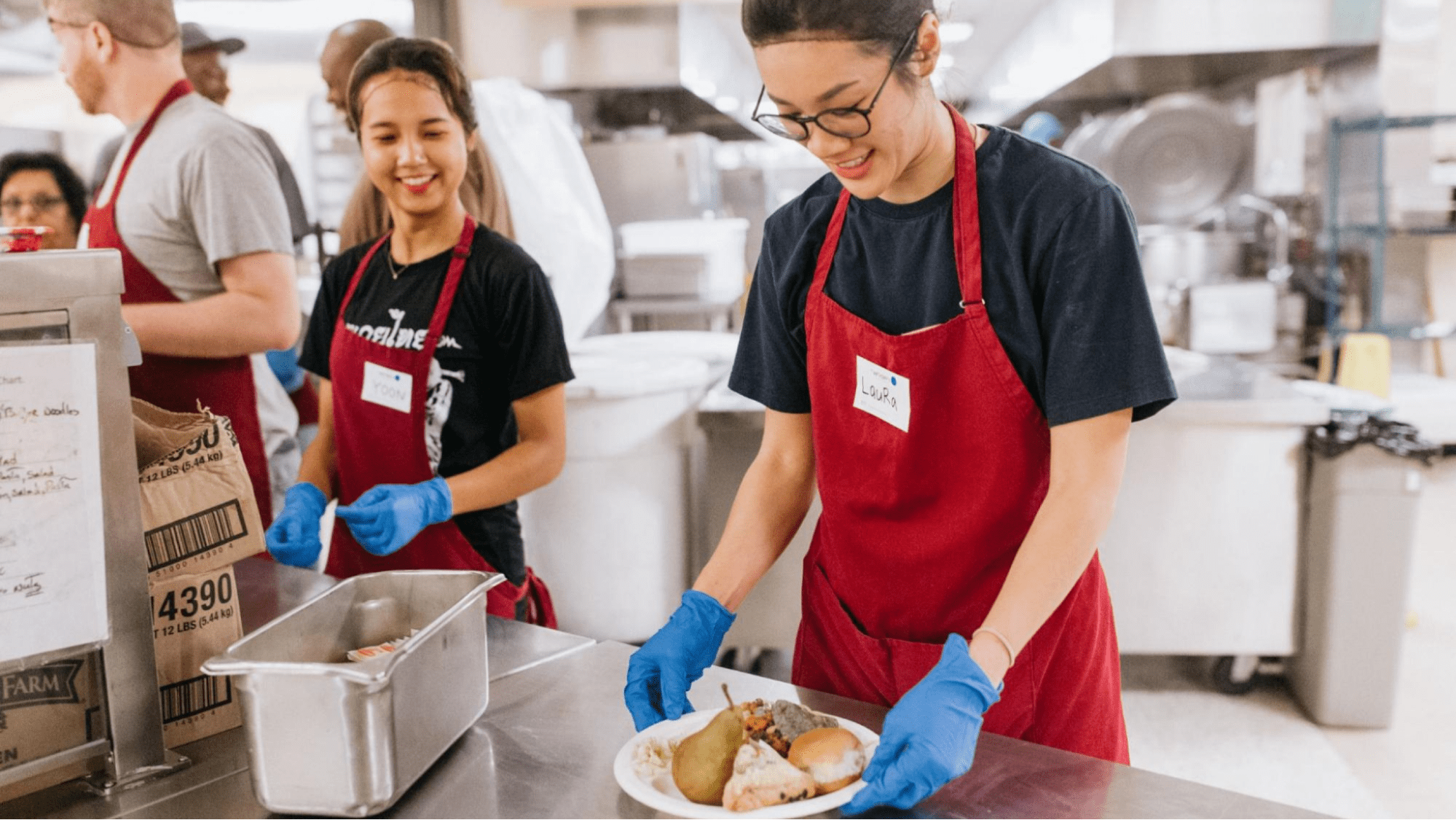 People volunteering at a food kitchen