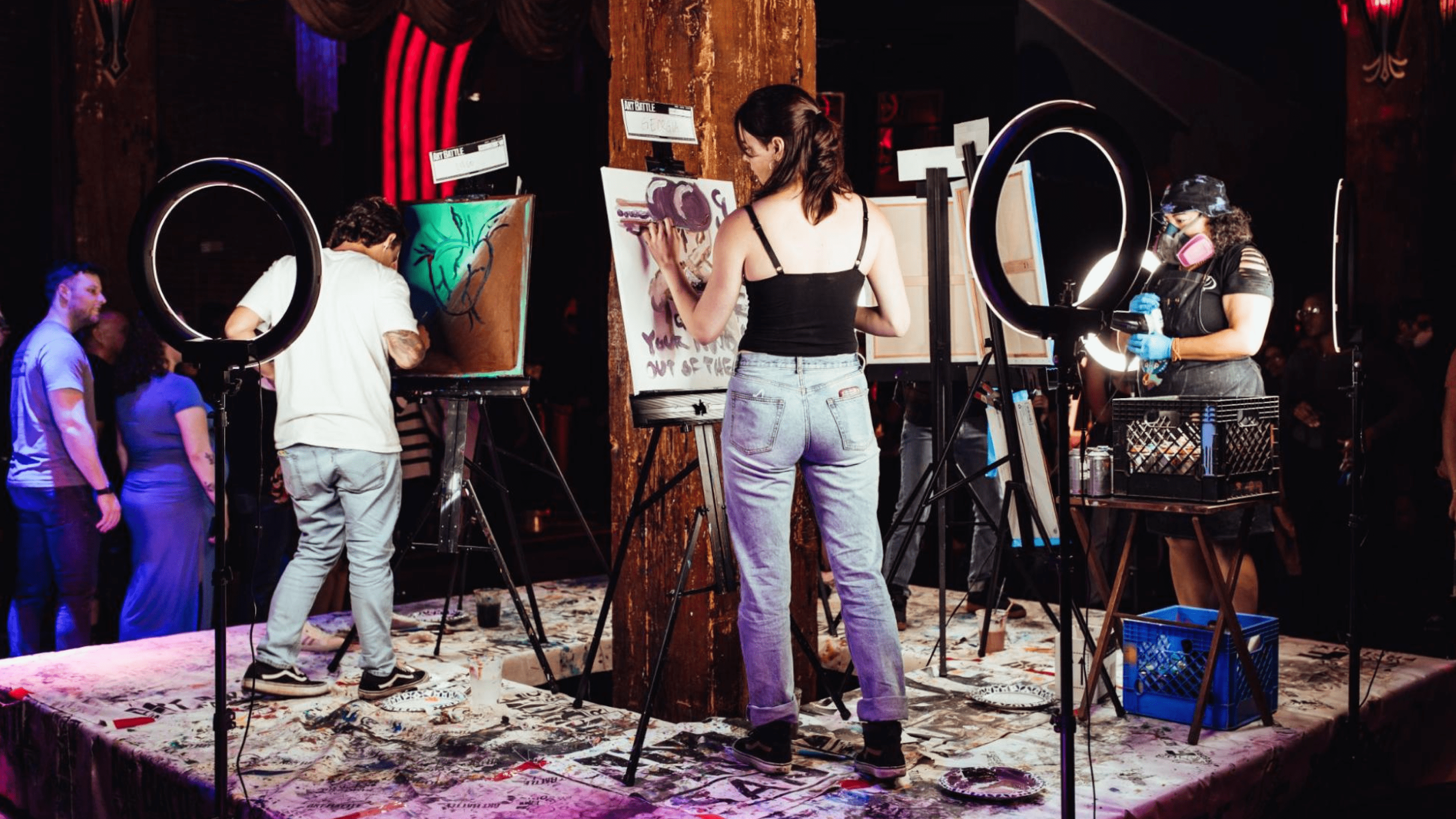 Artists painting together