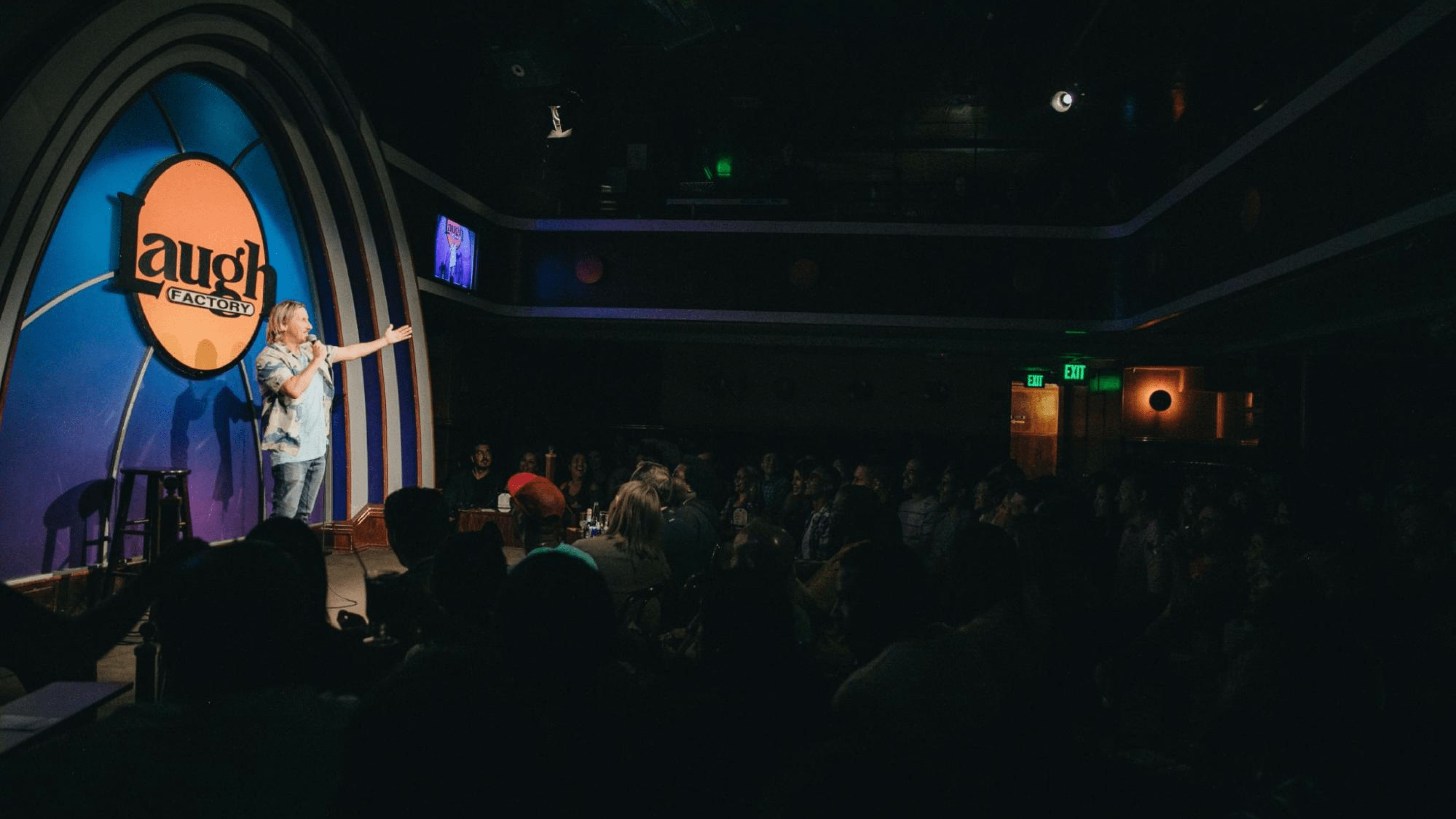 A person performing a standup comedy routine
