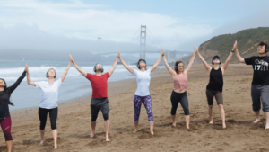 Attendees at outdoor yoga event in SF