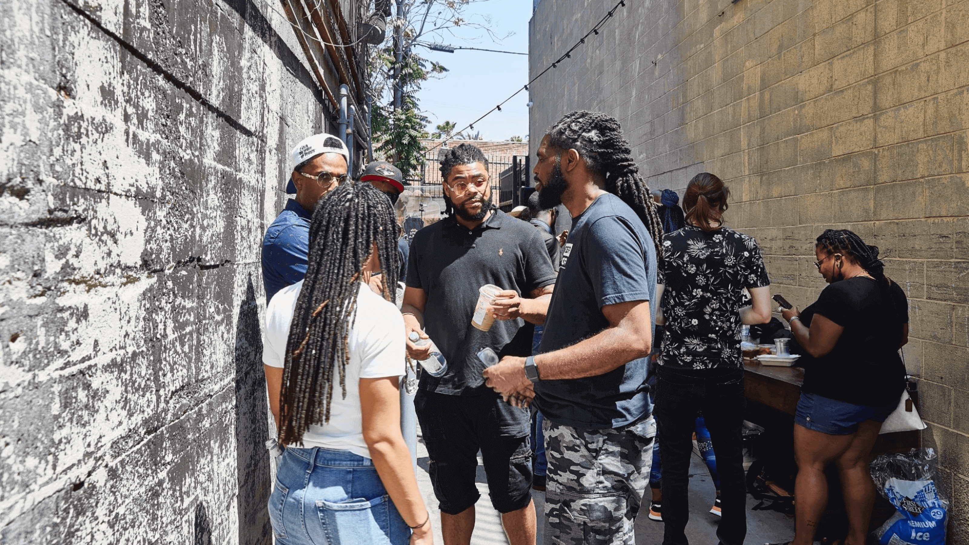 People talking at a block party