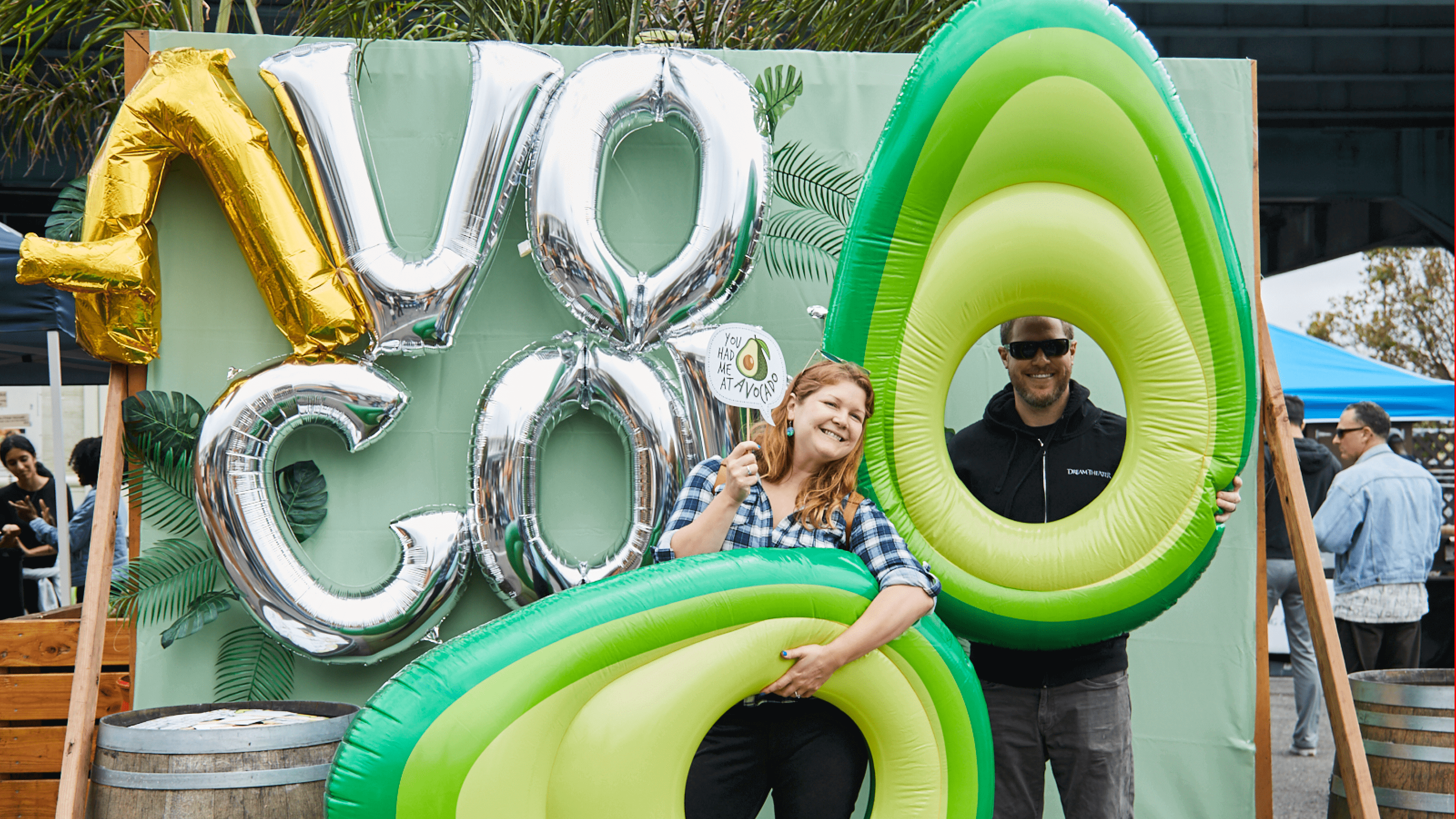 People posing in a photobooth