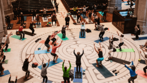 Attendees performing yoga poses