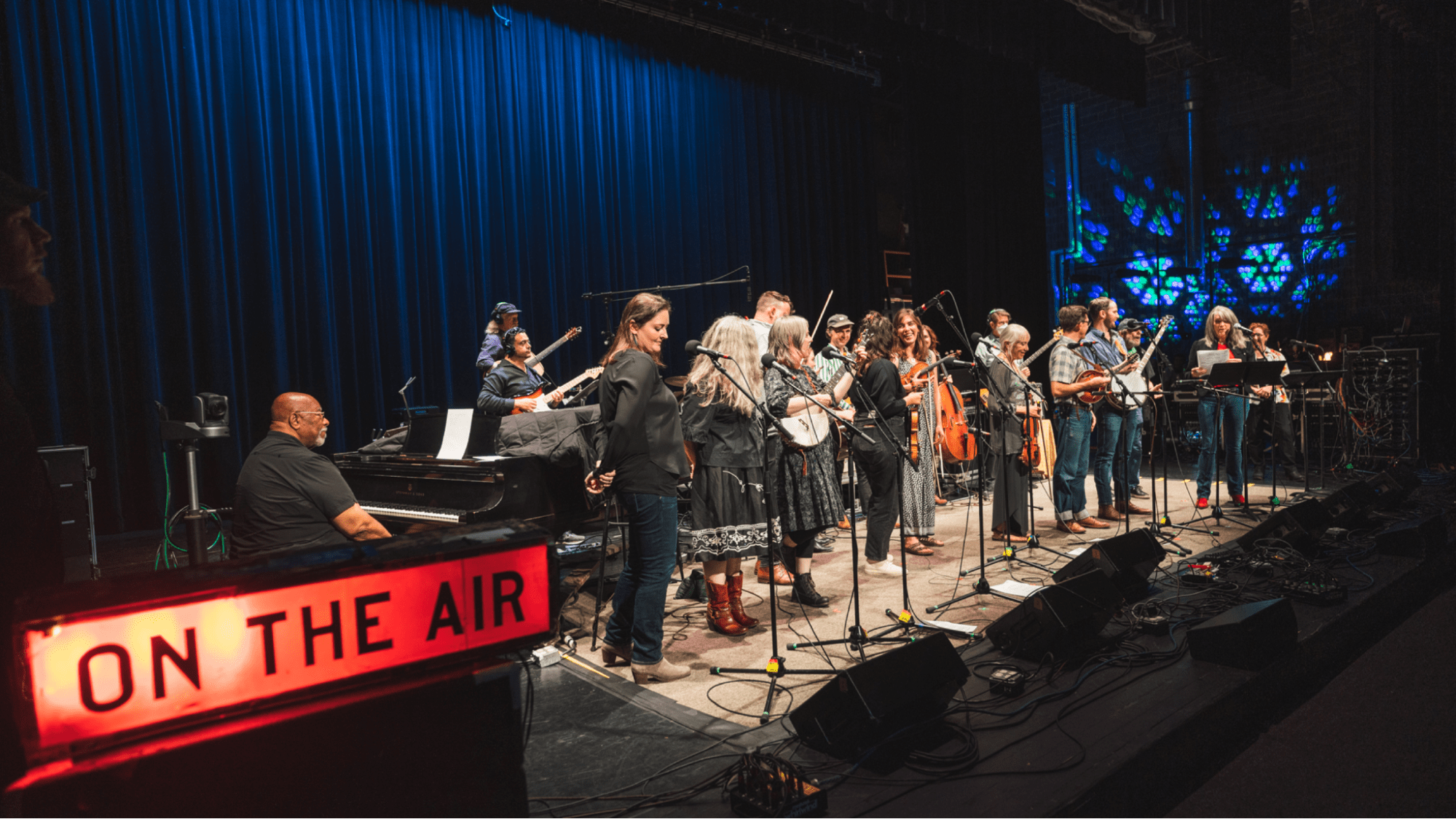 best name for event planning business Music event - performers on stage in a live performance