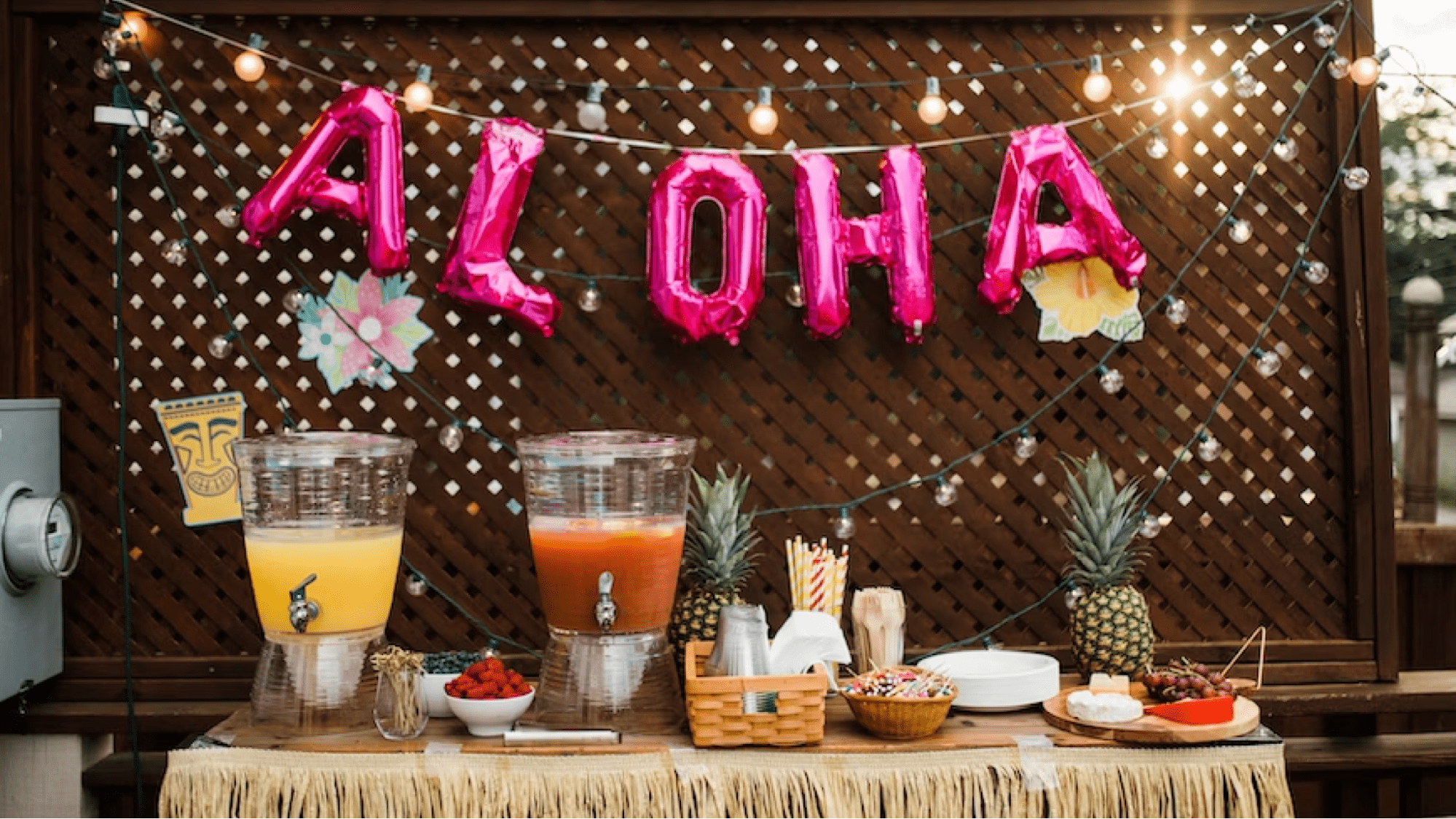 Table with drinks decorated for luau