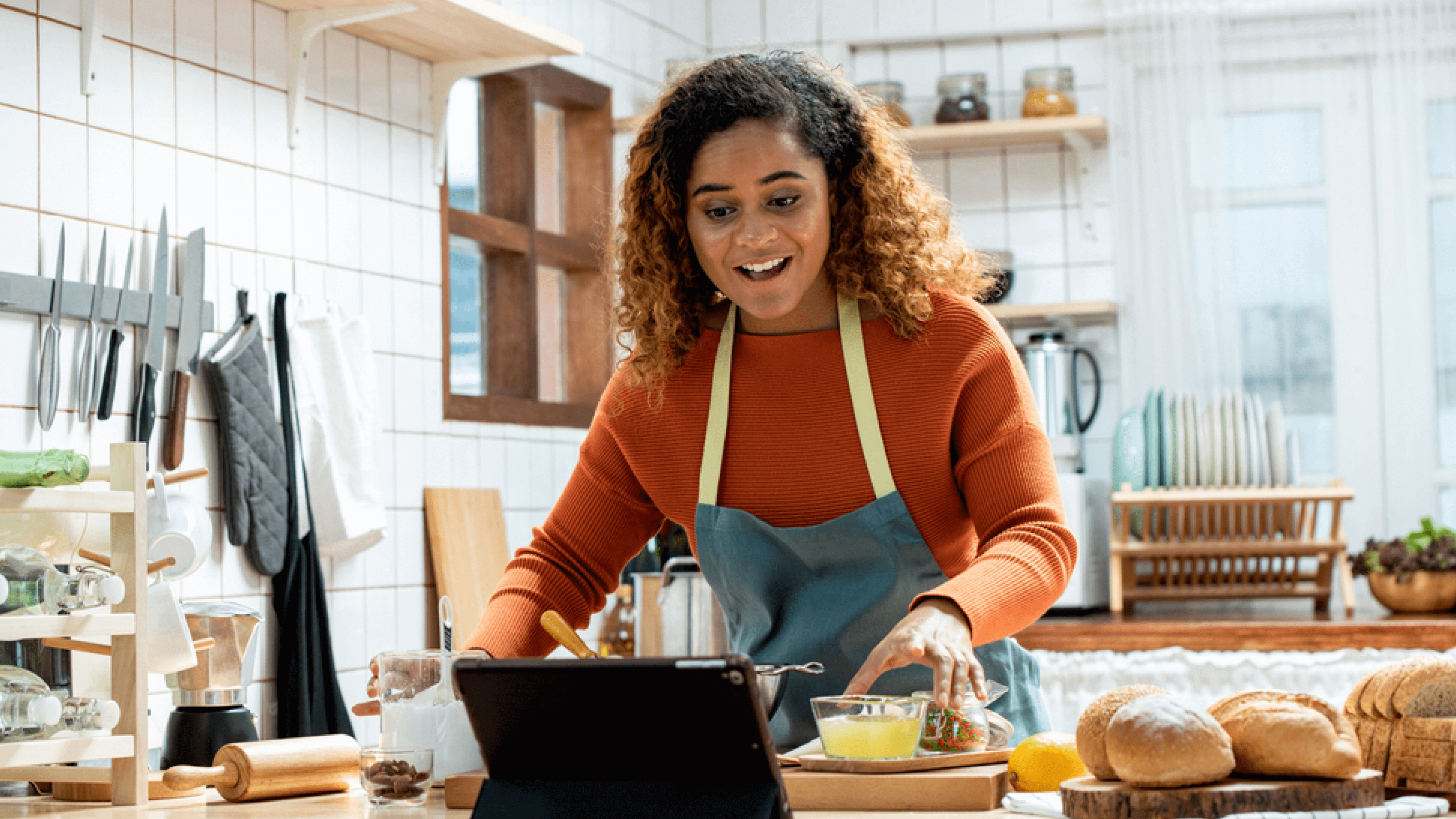 Woman taking an online cooking class