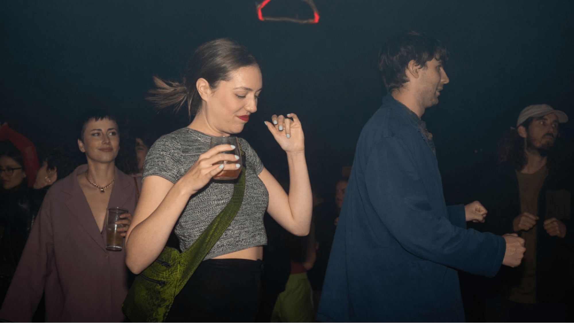 Woman dancing at nightclub 