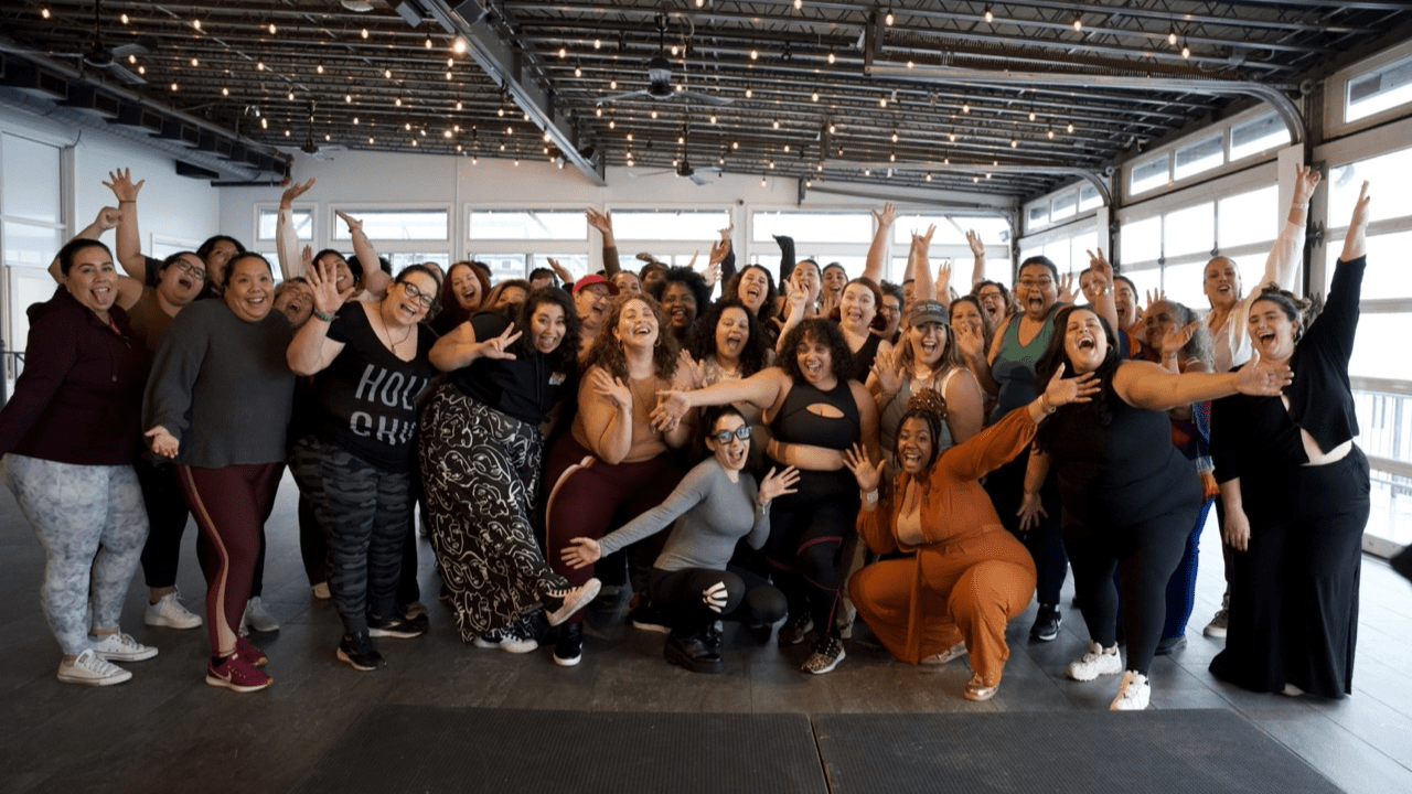 Group of event attendees dance