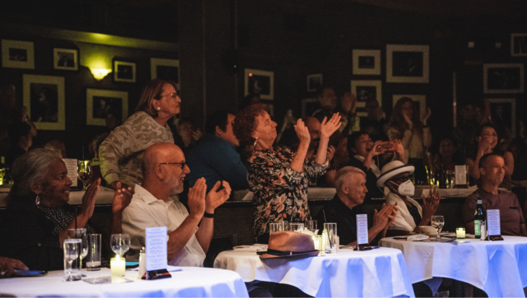 Attendees applauding