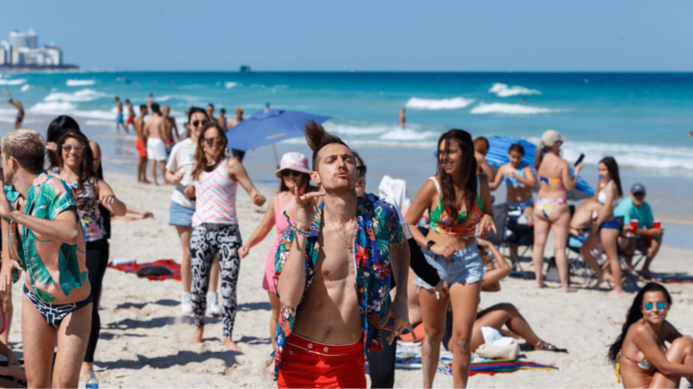 People dancing on the beach