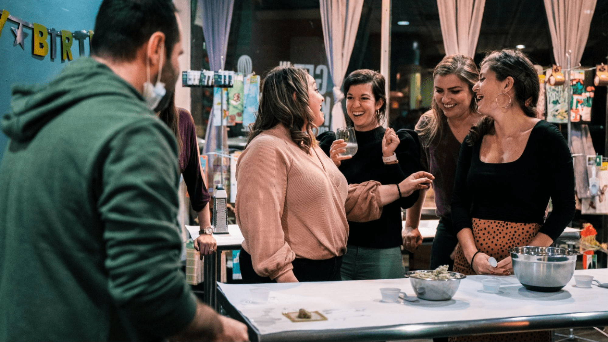 People laughing at cooking class