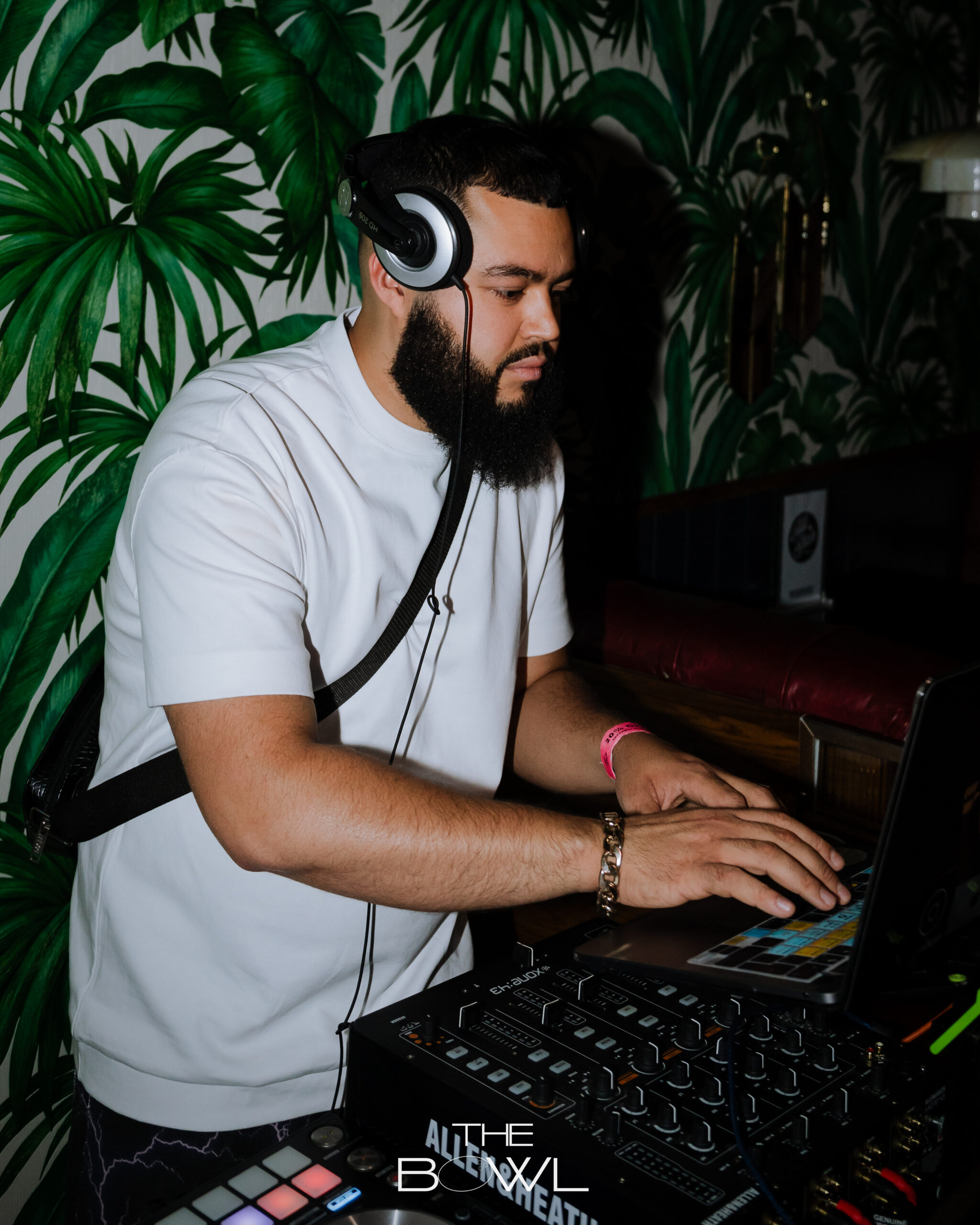 A DJ plays music at BennyBoys The Bowl event.