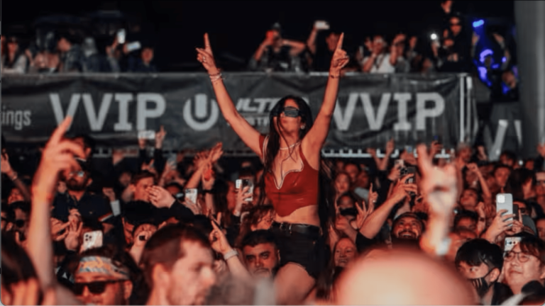 girl vibing at music festival crowd